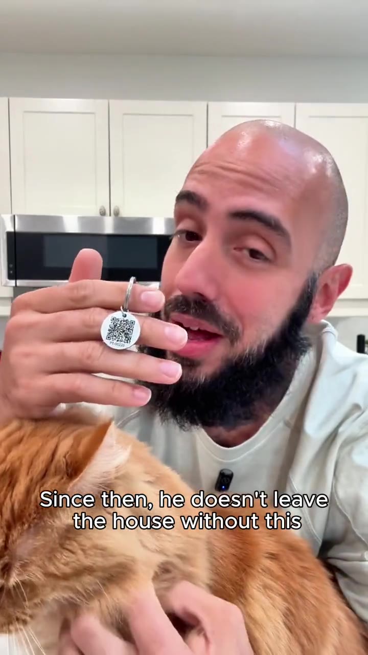Boris and his cat Eevee in the PawTrace reunion story video